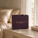 Elegancka torebka prezentowa z logo LE SILQUE burgundowa